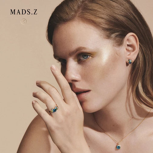 FOUR SEASONS WINTER øreringe i 14 kt. guld m. ægte sten og brillant